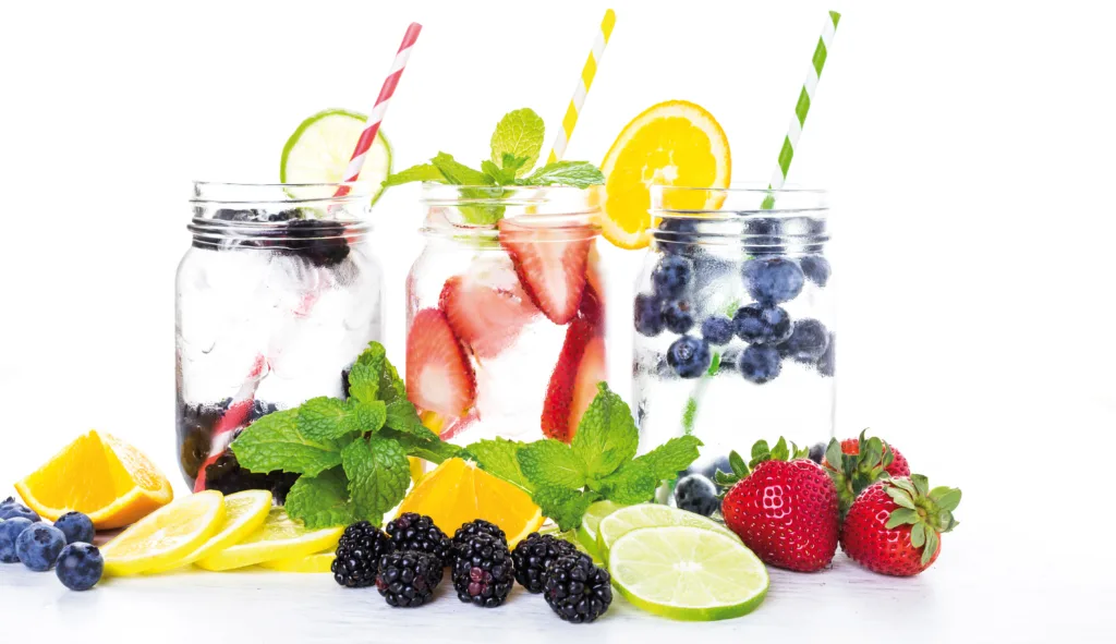 Mint, mandarin, lemon and fresh fruits - perfect detox water made for summer